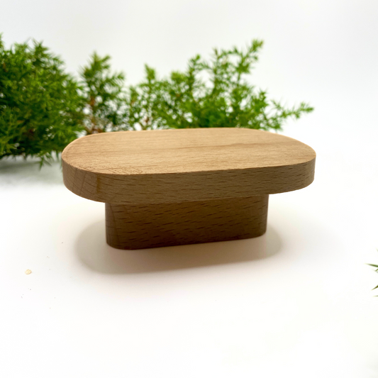 Natural wood oval drawer knob with smooth finish, minimalist design, ideal for cabinets, dressers, and furniture, eco-friendly solid wood