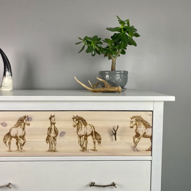 White Dresser With Engraved Horses